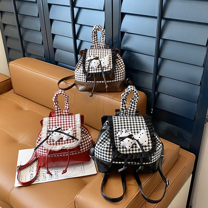 Playful backpack with checkered pattern and animal appliqué Kalsten