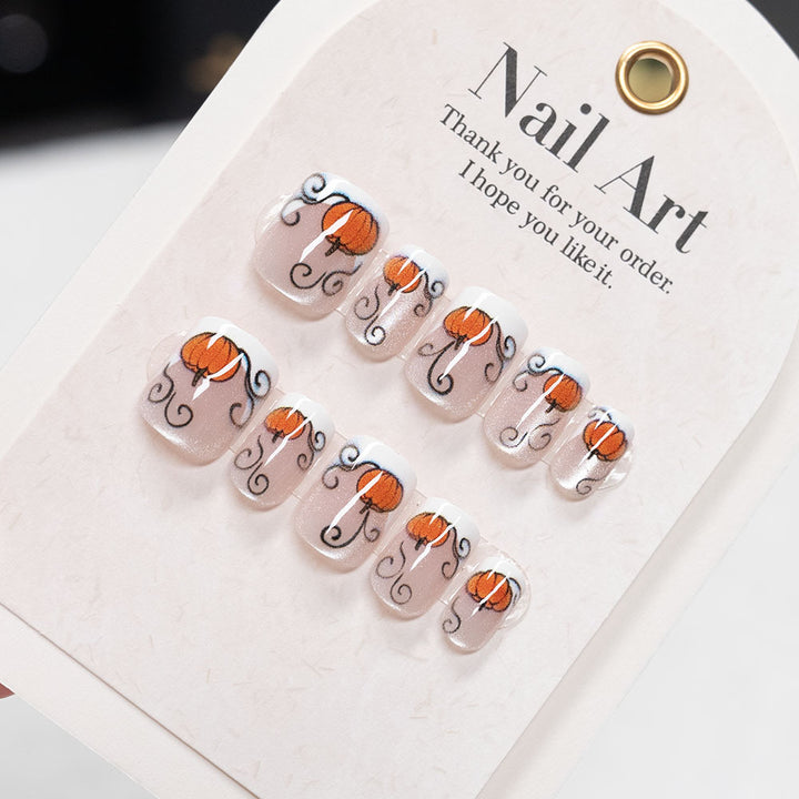 Festive Pumpkin-Themed Nail Art