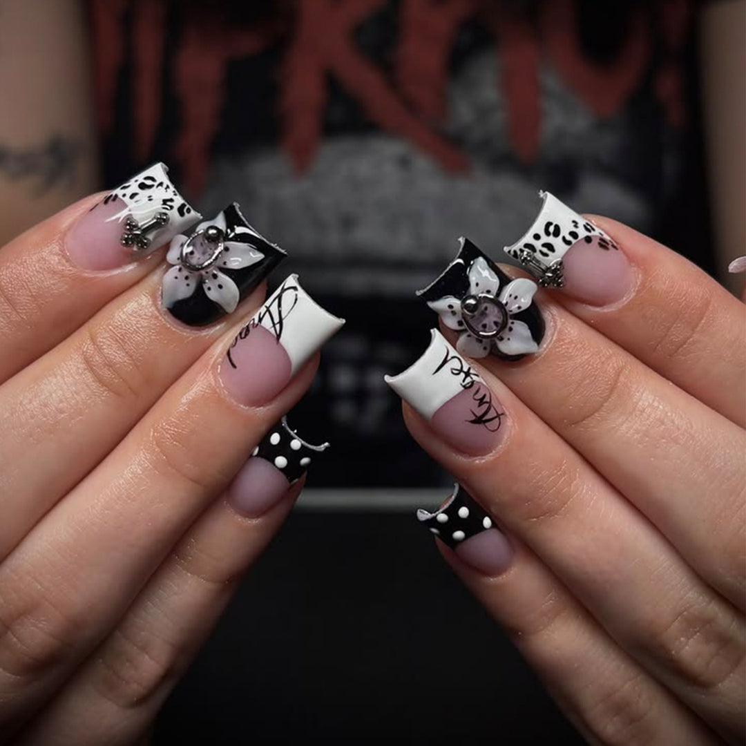 Artful nail extensions with elegant black-and-white design Kalsten