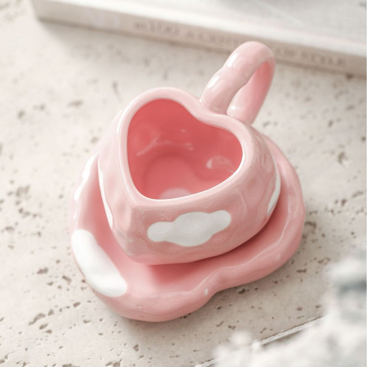 Heart-shaped ceramic cup set with saucer