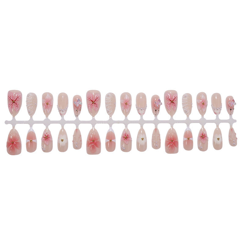 Creative nail art set with delicate flower and glitter embellishments Kalsten