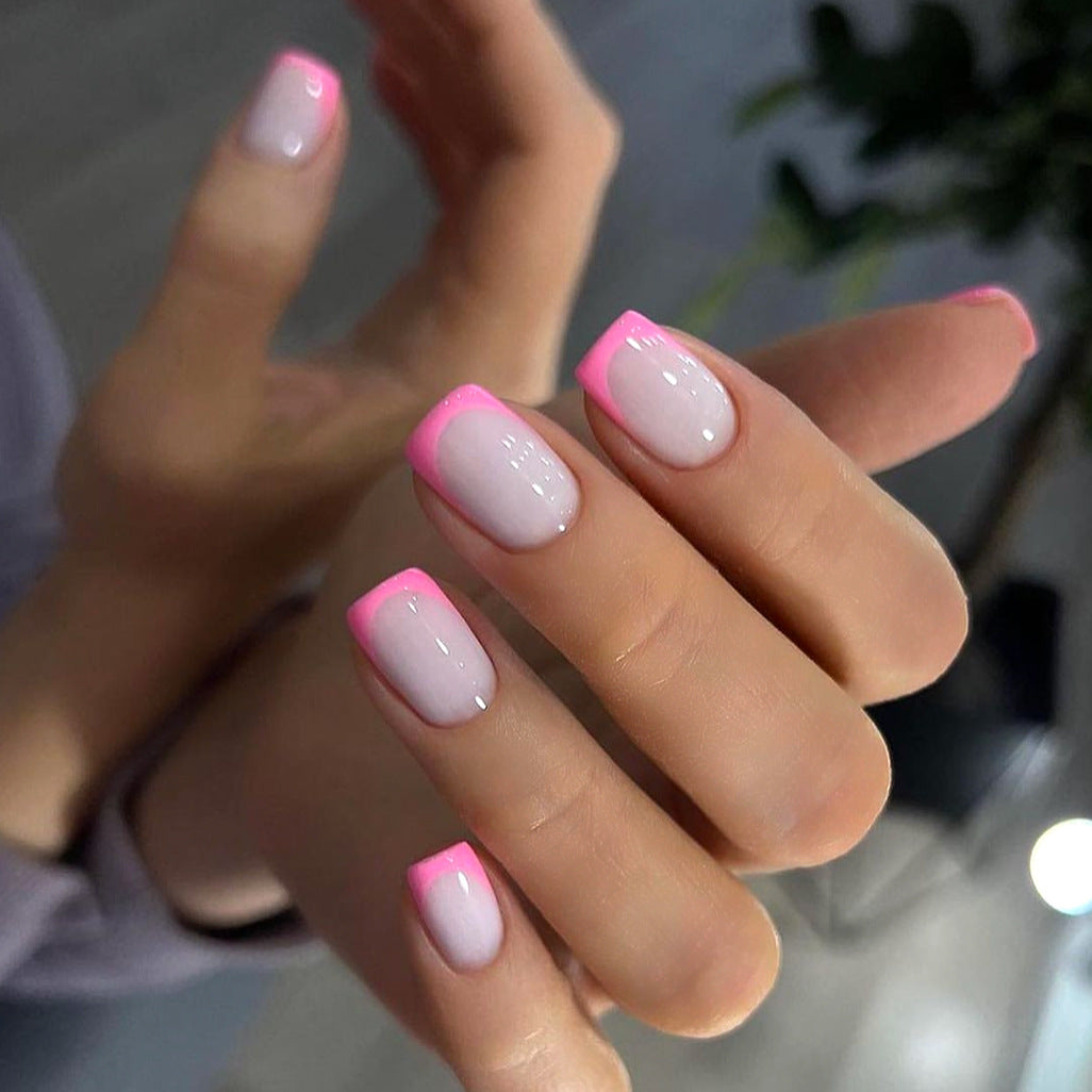 Artful nail design with elegant French tip and modern accents Kalsten