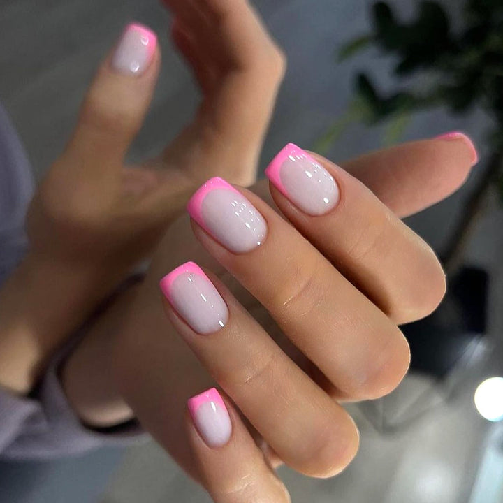 Artful nail design with elegant French tip and modern accents Kalsten