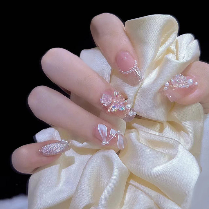 Glamorous artificial nails with moon and star motifs Kalsten