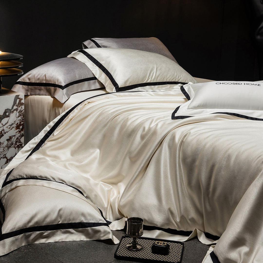 Luxurious satin bedding set with contrasting decorative trim