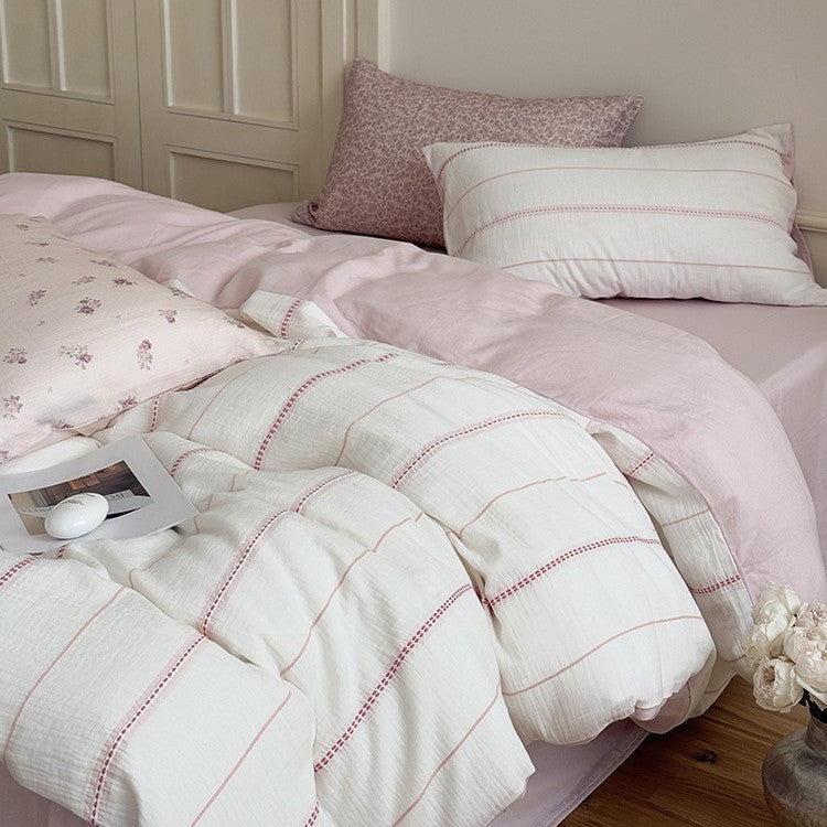 Breathable linen-cotton bedding set with quilted stripes and reversible design