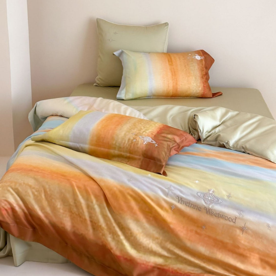 Reversible satin bedding set with delicate planet and star embroidery