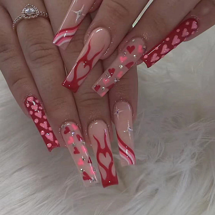 Artful Nail Art with Hearts and Glitter Accents Kalsten