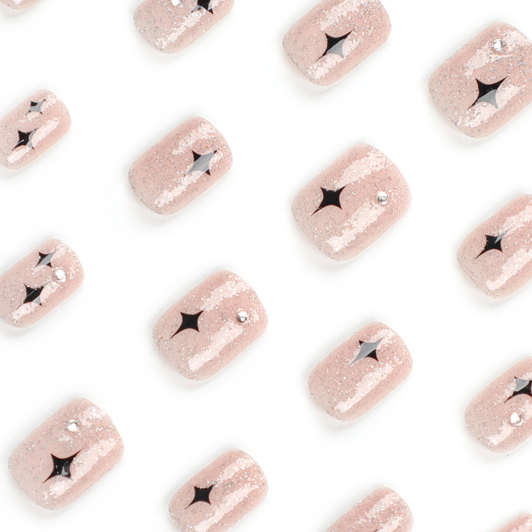 Artful Nail Extensions with Glitter and Star Pattern Kalsten