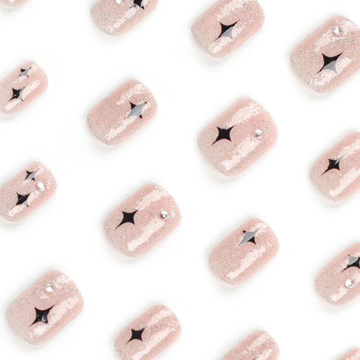 Artful Nail Extensions with Glitter and Star Pattern Kalsten