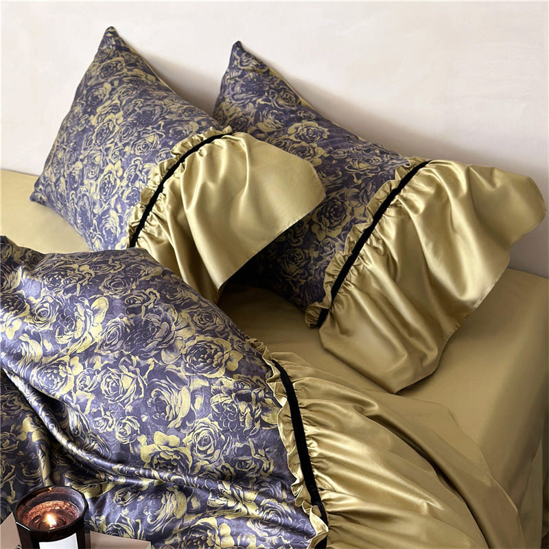 Reversible luxury bedding set made of cotton satin with gathered ruffle, floral jacquard inner side and contrasting velvet piping