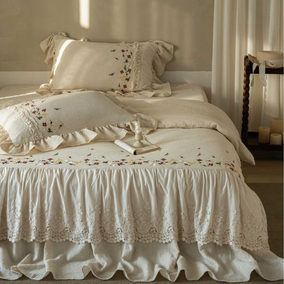 Romantic bedding set with lace bed skirt, embroidered floral decor and ruffle