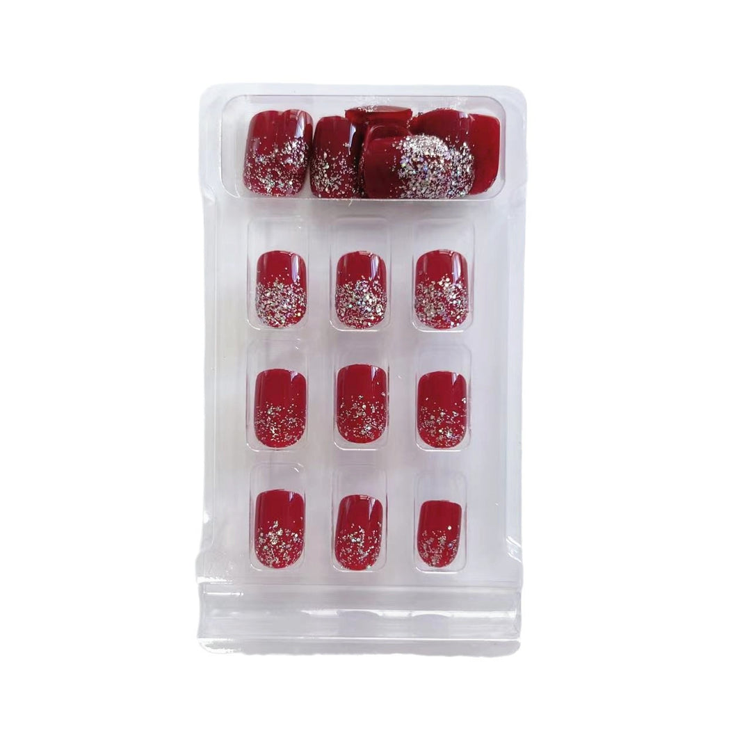 Glamorous artificial nails with glitter accents Kalsten