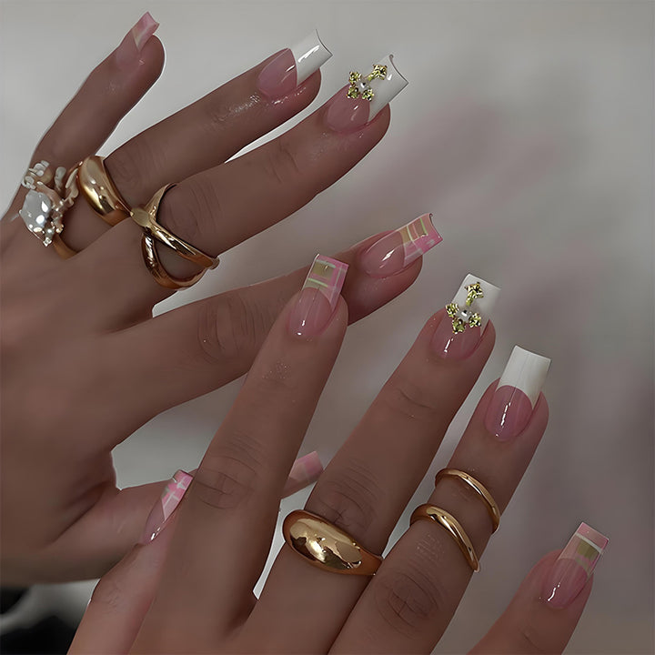 Artificial nail kit with elegant French tips and modern accents Kalsten