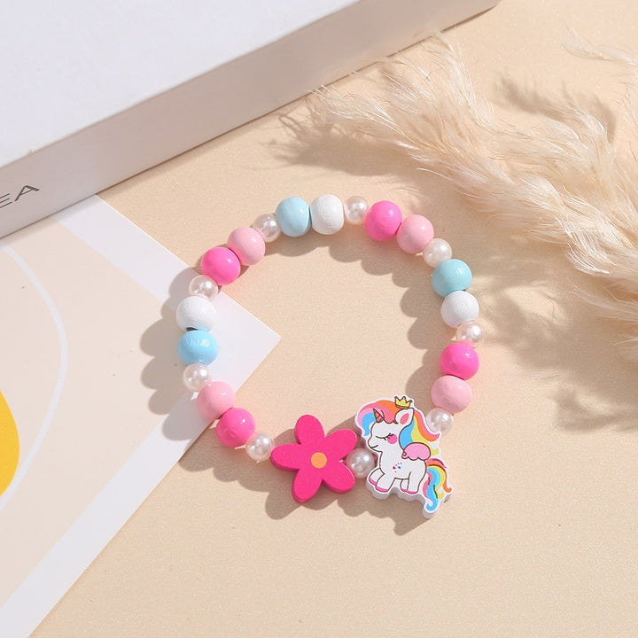 Playful children's bracelet with unicorn and flower motif Kalsten