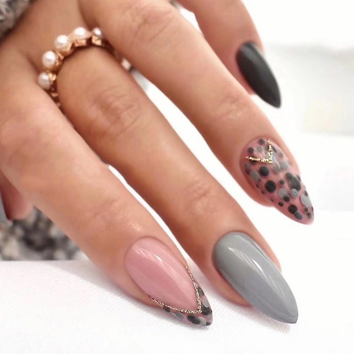 Artful stiletto nails with elegant accent design Kalsten