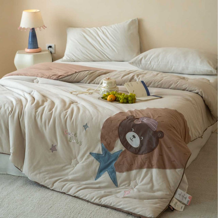 Children's quilt with cute bear appliqué and soft filling