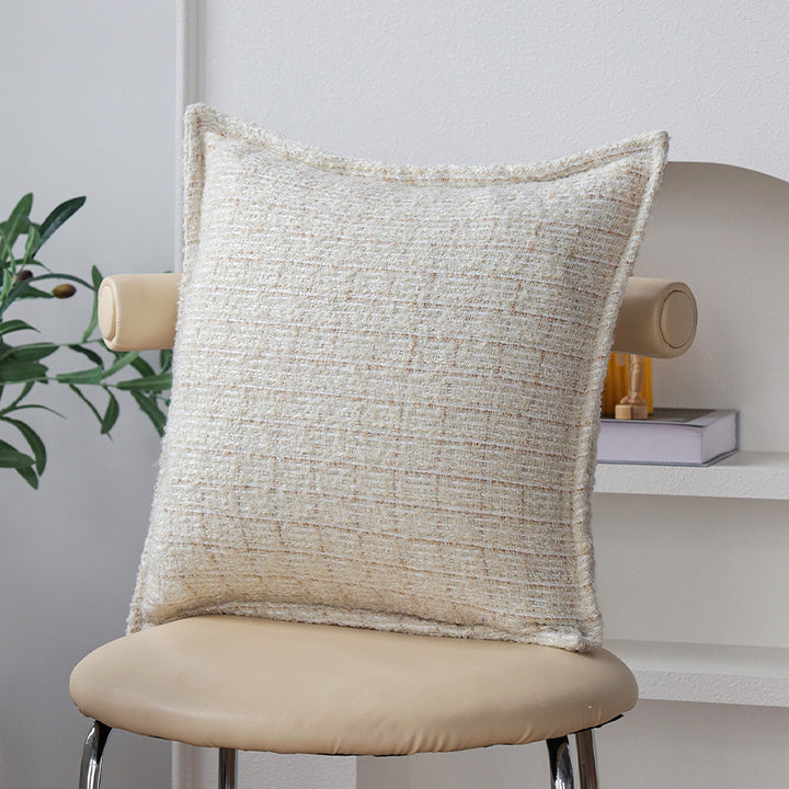 Square cushion cover made of textured bouclé blend with decorative piped seam Kalsten