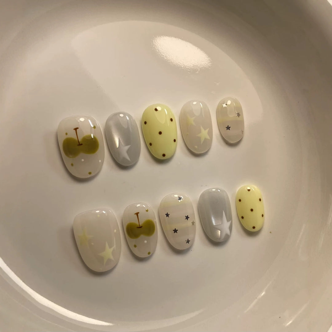 Artistic Press-On Nail Set with Whimsical Patterns