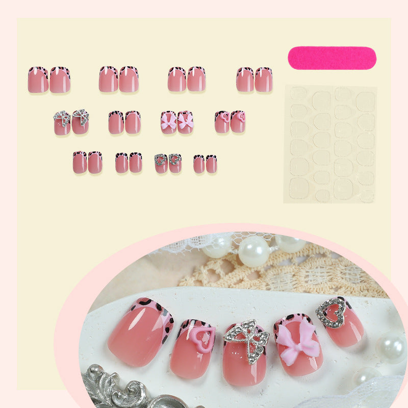 Decorative Press-On Nail Set with Artistic Bow and Heart Accents kalsten