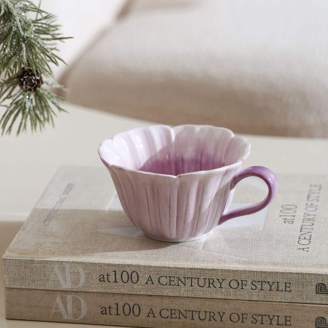 Ceramic mug with saucer in flower shape
