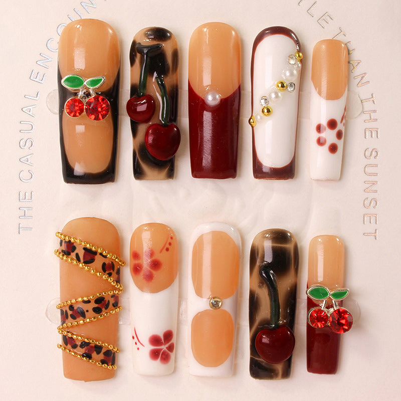 Nail art set with luxurious cherry and glitter accents Kalsten