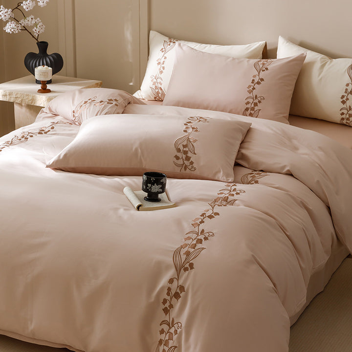 Embroidered bedding set made of cotton satin with floral vine embroidery