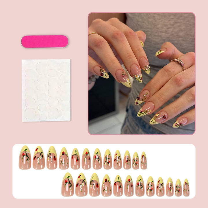 Artificial nail set with elegant gradient and floral accents Kalsten