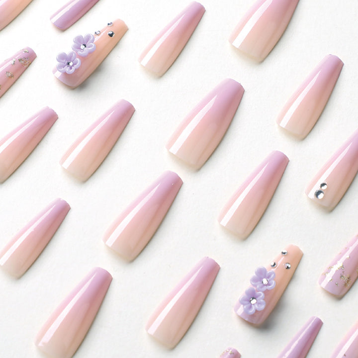 Artistic Gel Nails with Floral Design and Glitter Accents Kalsten