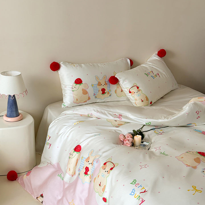 Children's bedding set with cute bunny print, pom-pom corners, and soft cotton satin