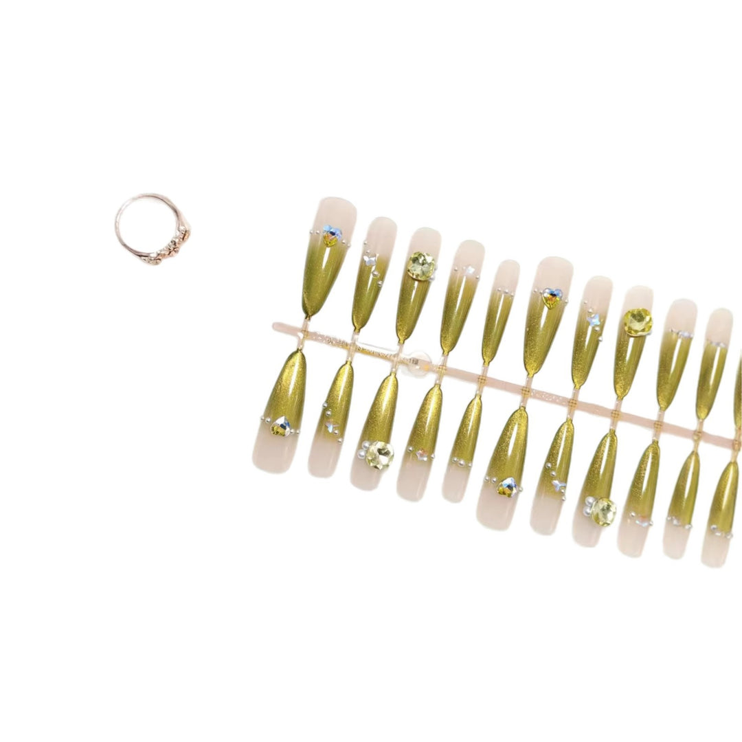 Artificial nail set with glamorous jewelry embellishments Kalsten