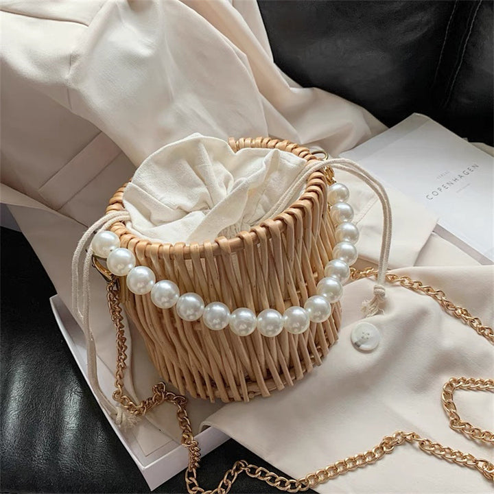 Women’s handbag with elegant pearl handle and braided design Kalsten