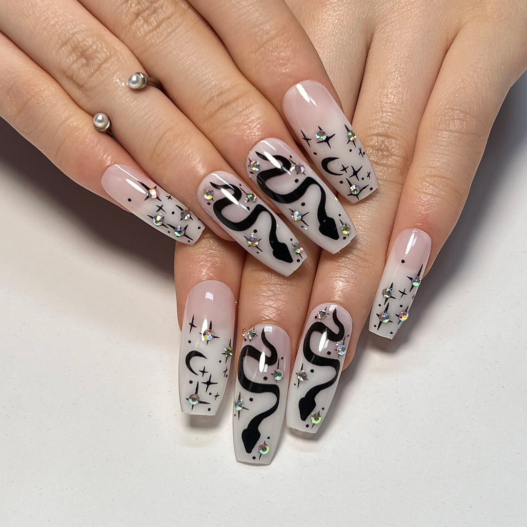 Artful gel nails with elegant 3D design and glitter accents Kalsten