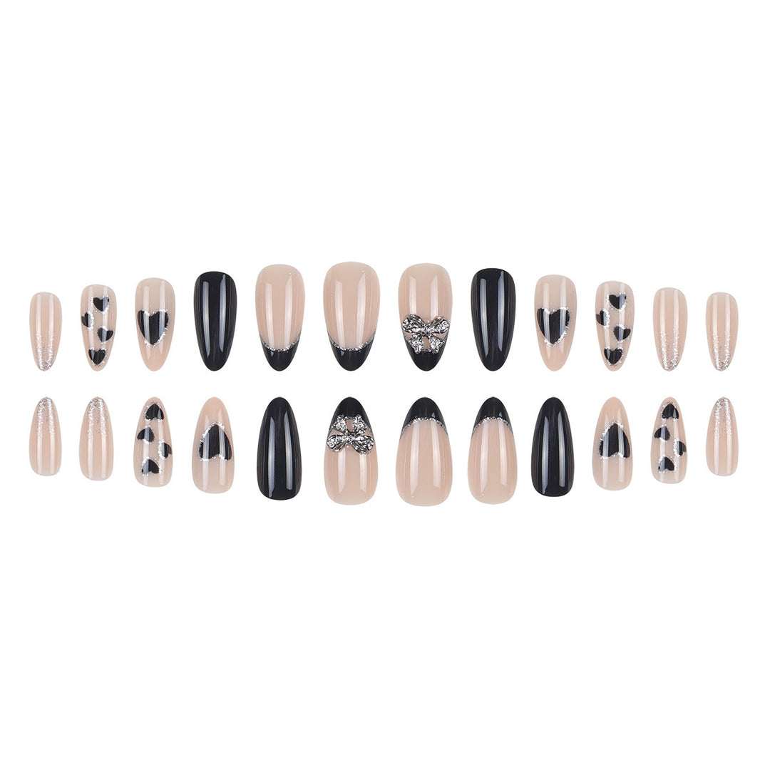 Artistic Stiletto Press-On Nails with Heart and Bow Accents Kalsten