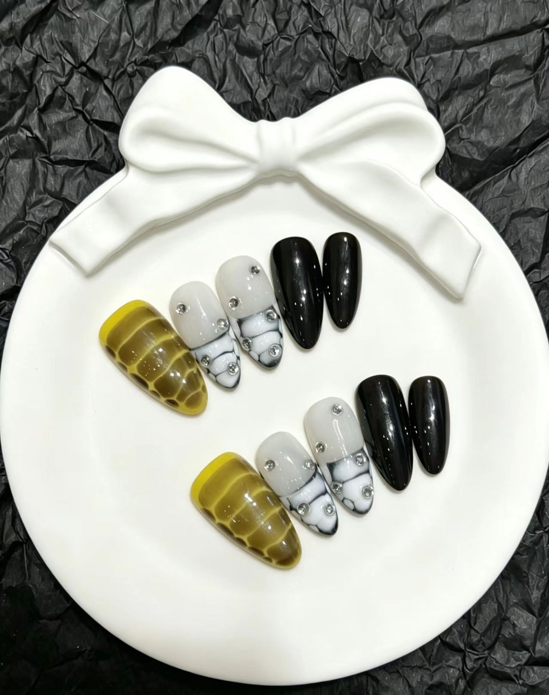 Artistic Press-On Nail Set with Decorative Gem Accents