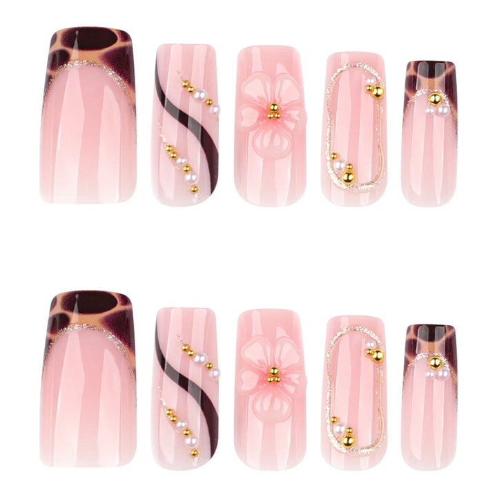 Artificial nail art with flower and glitter effects Kalsten