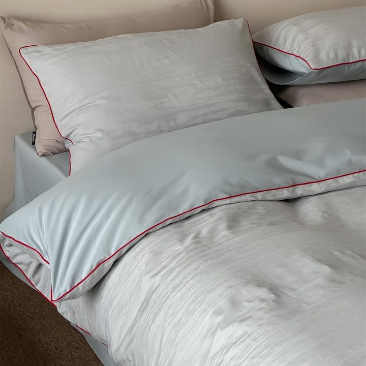 Structured cotton bedding with fine relief texture