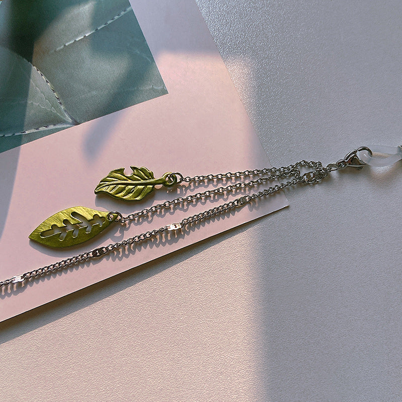 Fashionable glasses holder chain with leaf motifs Kalsten