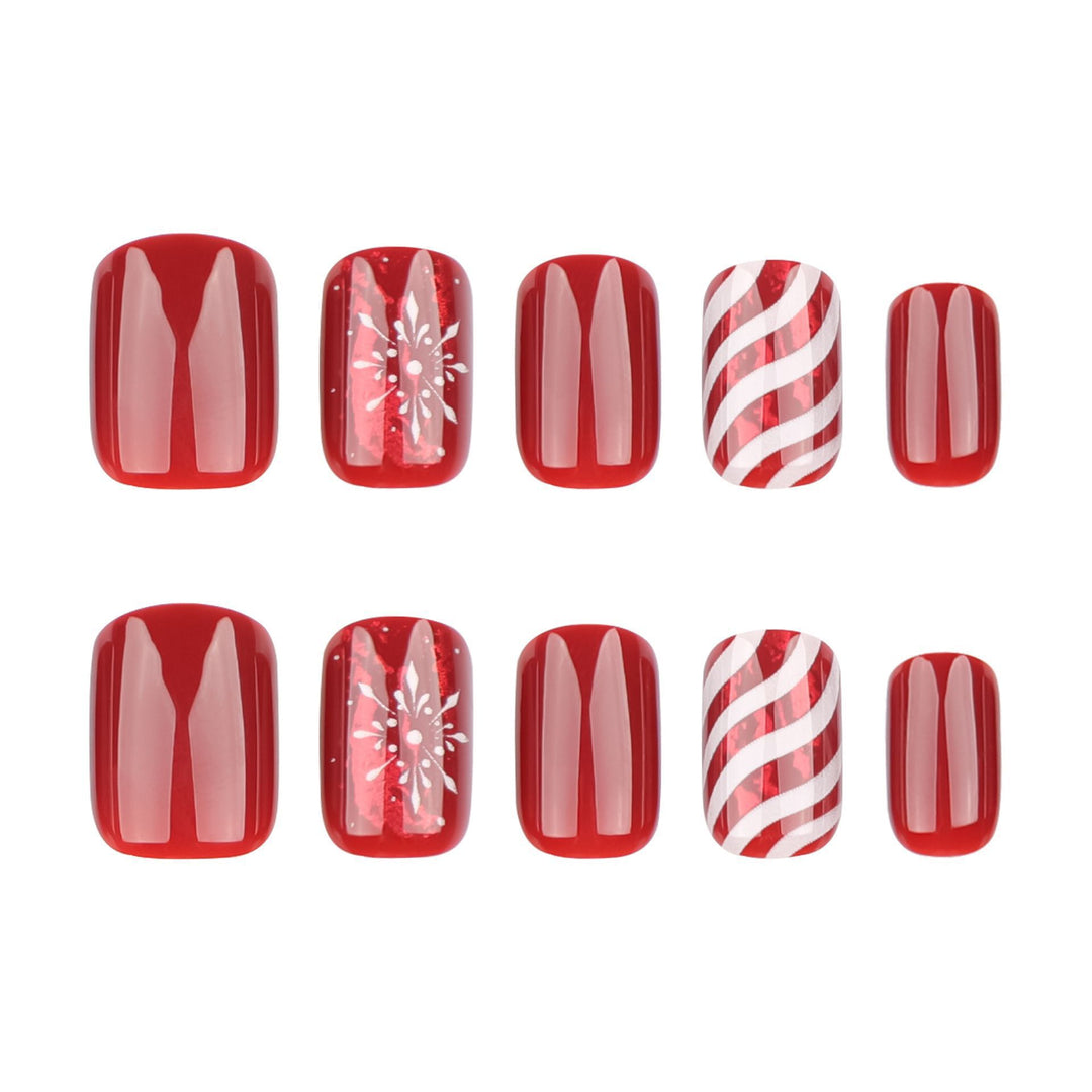 Artificial nail set with festive designs and glitter accents Kalsten