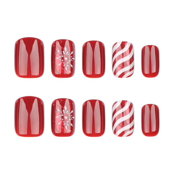 Artificial nail set with festive designs and glitter accents Kalsten