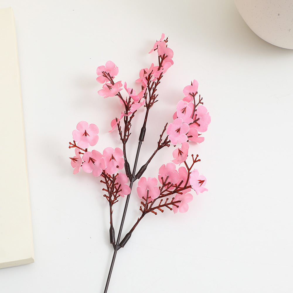 Decorative artificial flower branch