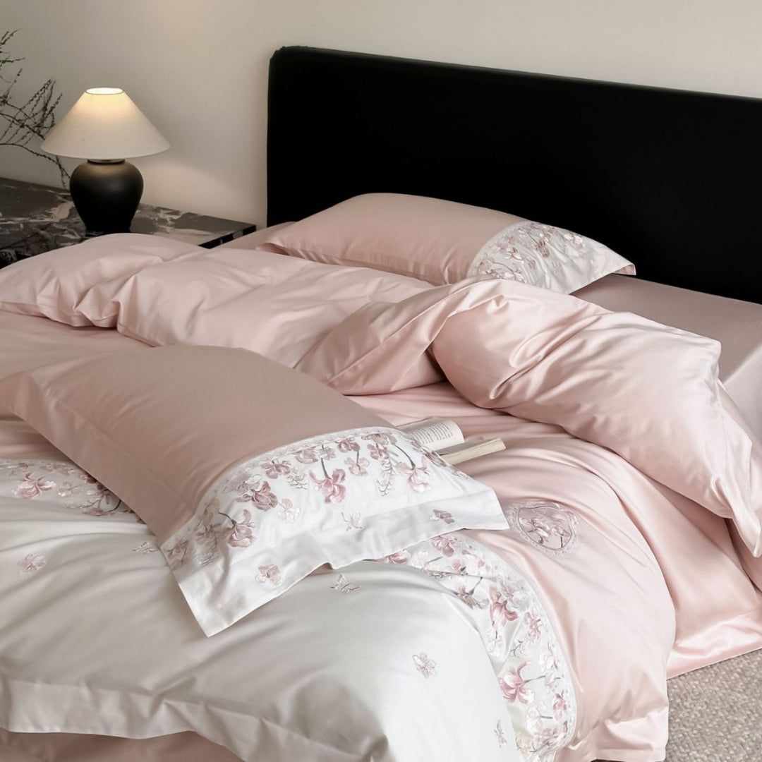 Luxurious satin bedding set with floral stitched border