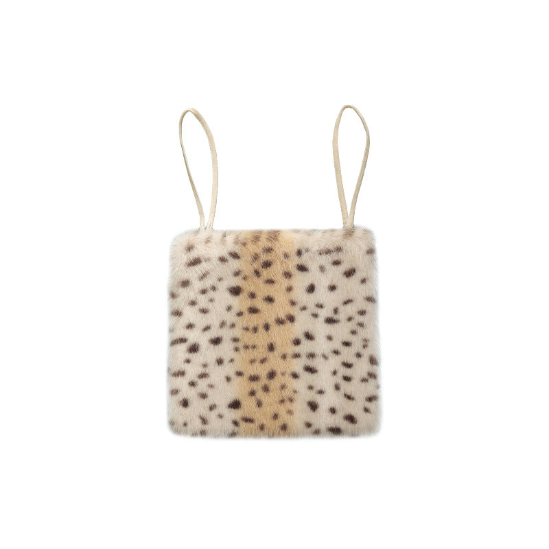Mini shoulder bag with faux fur cover and narrow straps