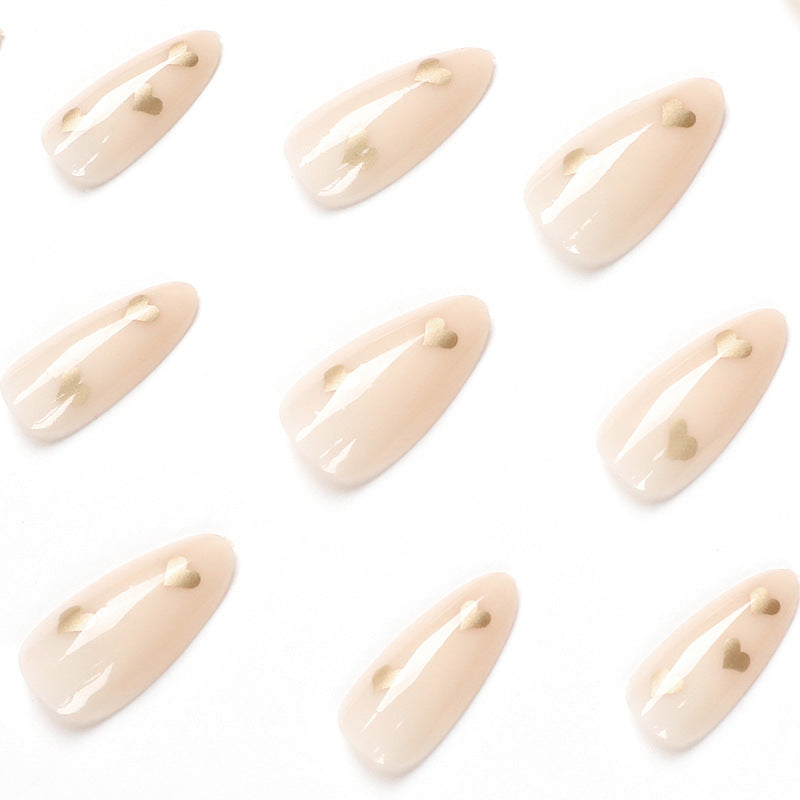 Artful Nail Art with Golden Heart Accents Kalsten
