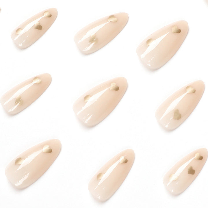 Artful Nail Art with Golden Heart Accents Kalsten