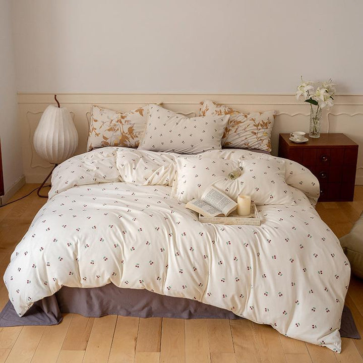 Quilted bedding set with floral vintage look and breathable cotton cover