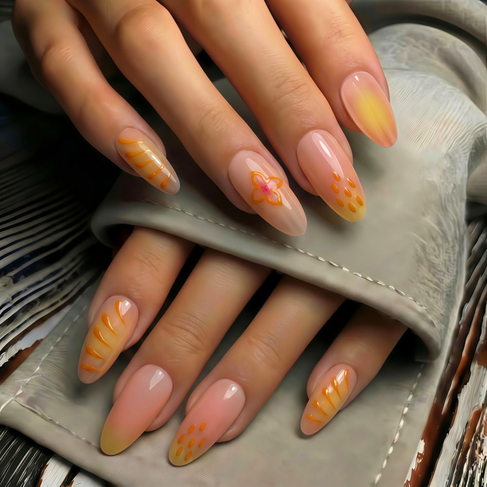 Artful Nail Tips with Floral Motifs Kalsten