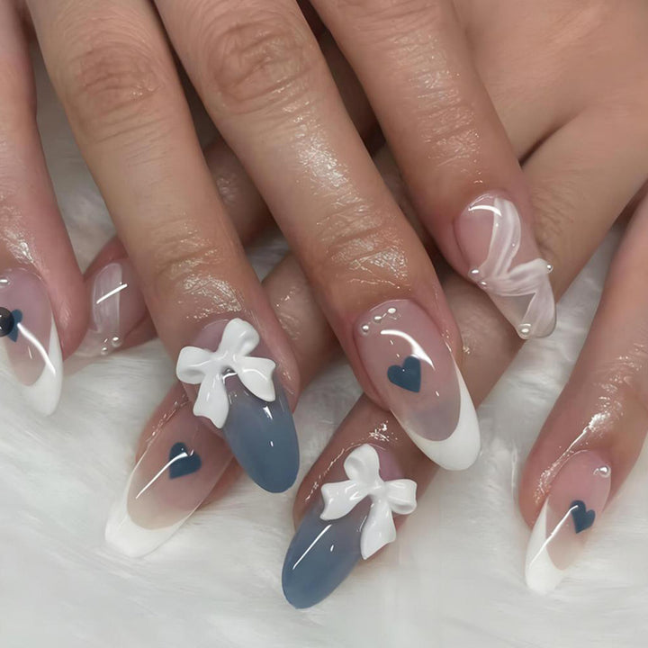 Artificial nail set with elegant bows and heart-shaped accents Kalsten