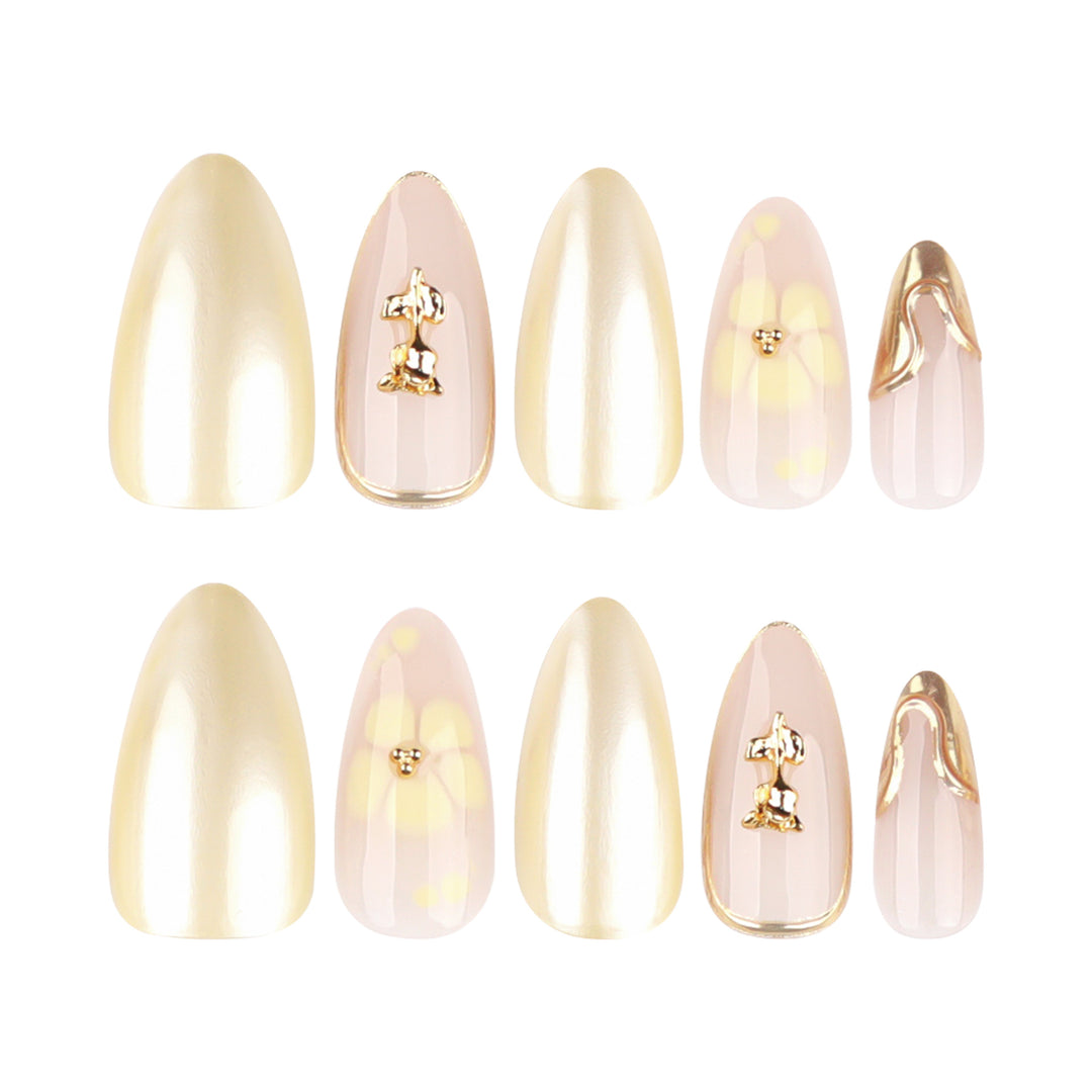 Artful nail art with floral decorations and glitter accents Kalsten