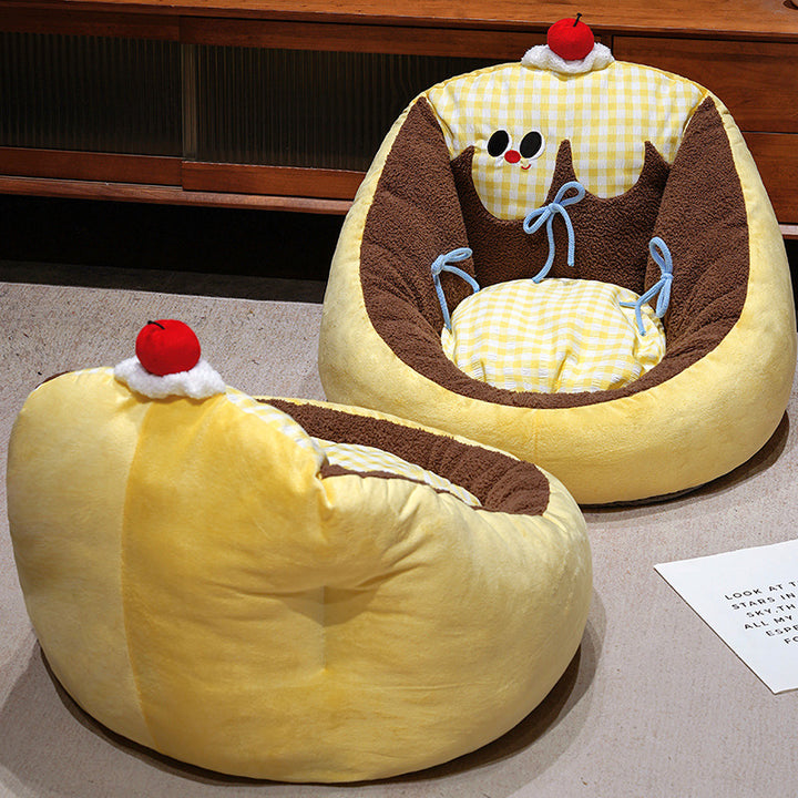 Cozy plush pet bed in cake shape with surrounding edge